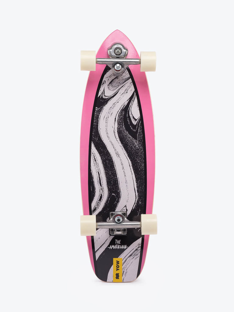 Deska surfskate YOW Amatriain 33.5″ Surfskate. Deskorolka w różowo-czarnym designie z białymi kołami.